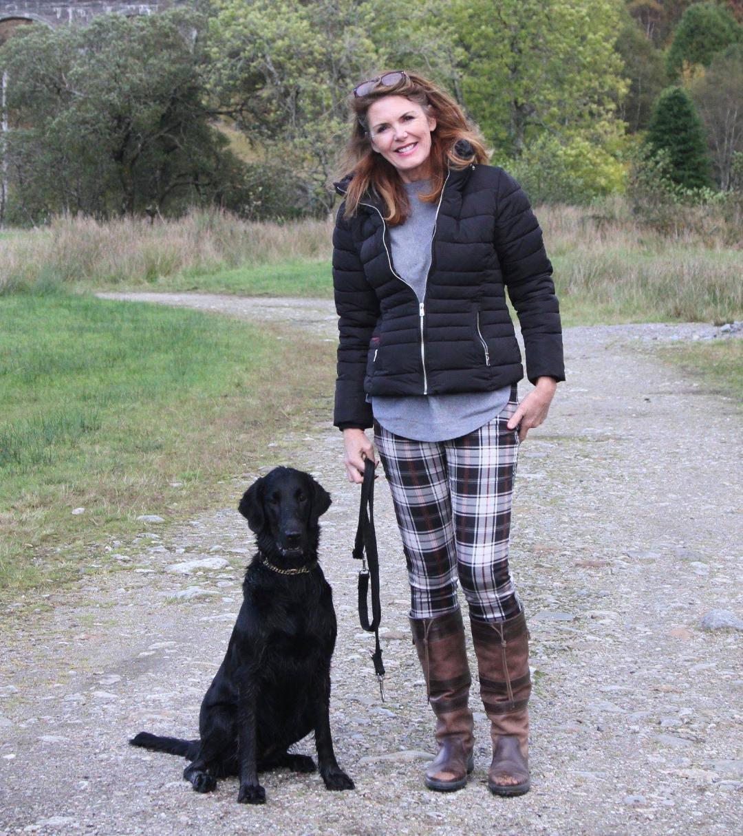 jacqui with flatcoated retriever puppy
